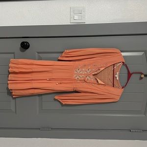 Brad miss me beautiful dress with beautiful details on it..